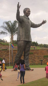 Statue_of_Nelson_Mandela_at_Union_Buildings,_Pretoria,_December_2013.jpg